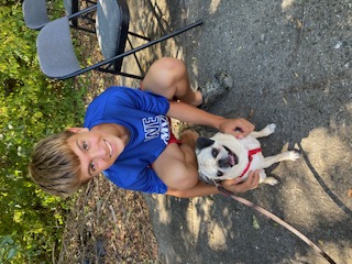 Will with a dog outside